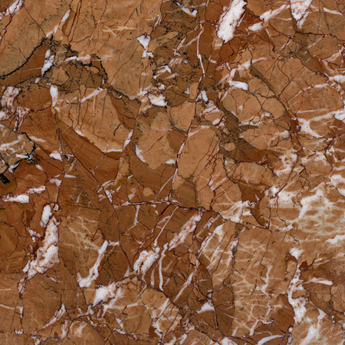 Anatolian Red | marble tile Anatolian Red marble tile — terracotta and warm red tones, angular pale fragments within a richly contrasting matrix