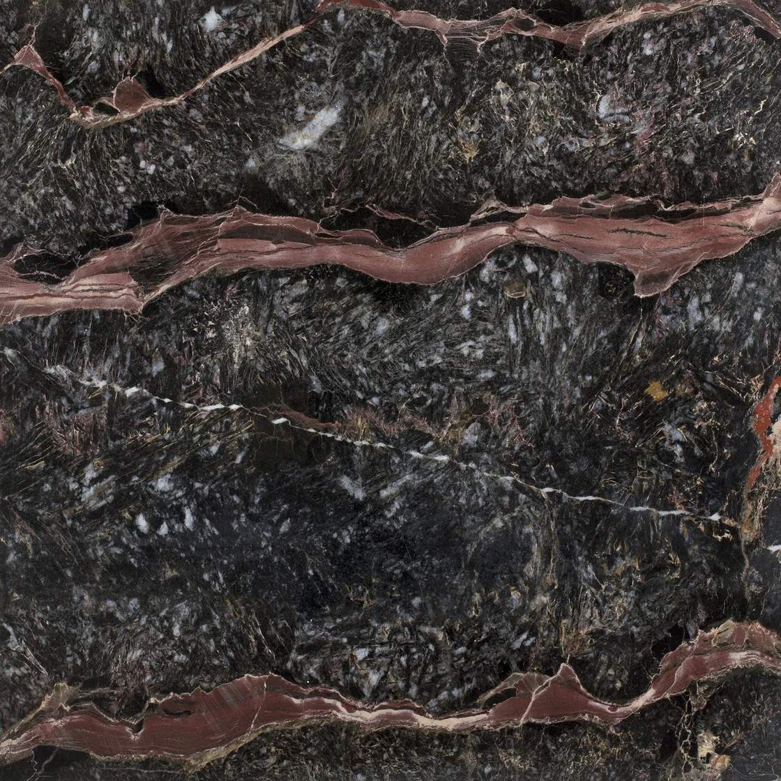 Breccia Notre Dame | marble tile Breccia Notre Dame marble tile — deep charcoal and smoky grey tones, a distinctive rose-coloured ribbon among fine pale veins