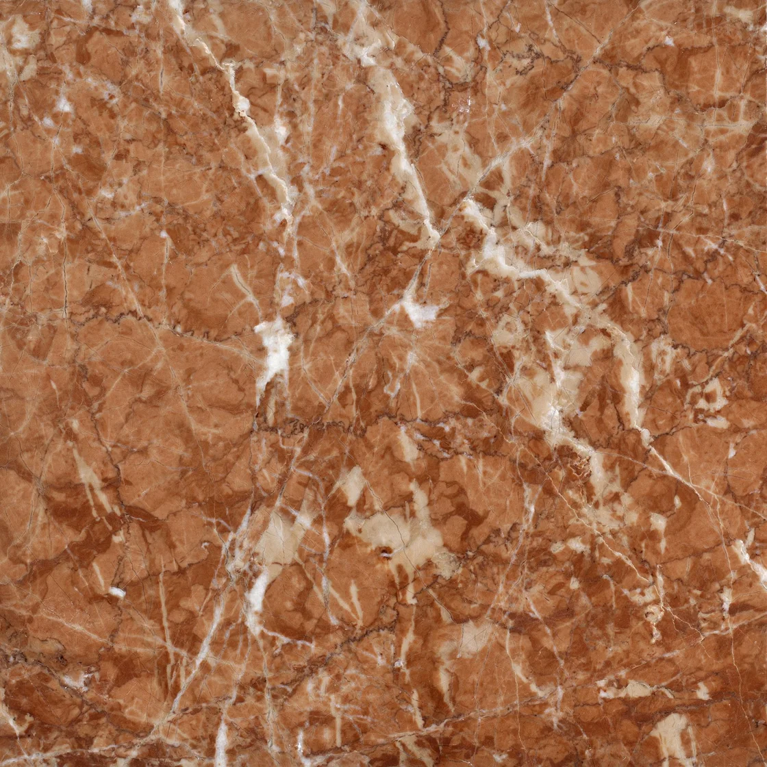 Burdur Rose | marble tile Burdur Rose marble tile — terracotta and warm red tones, a web of intersecting cream and white veins