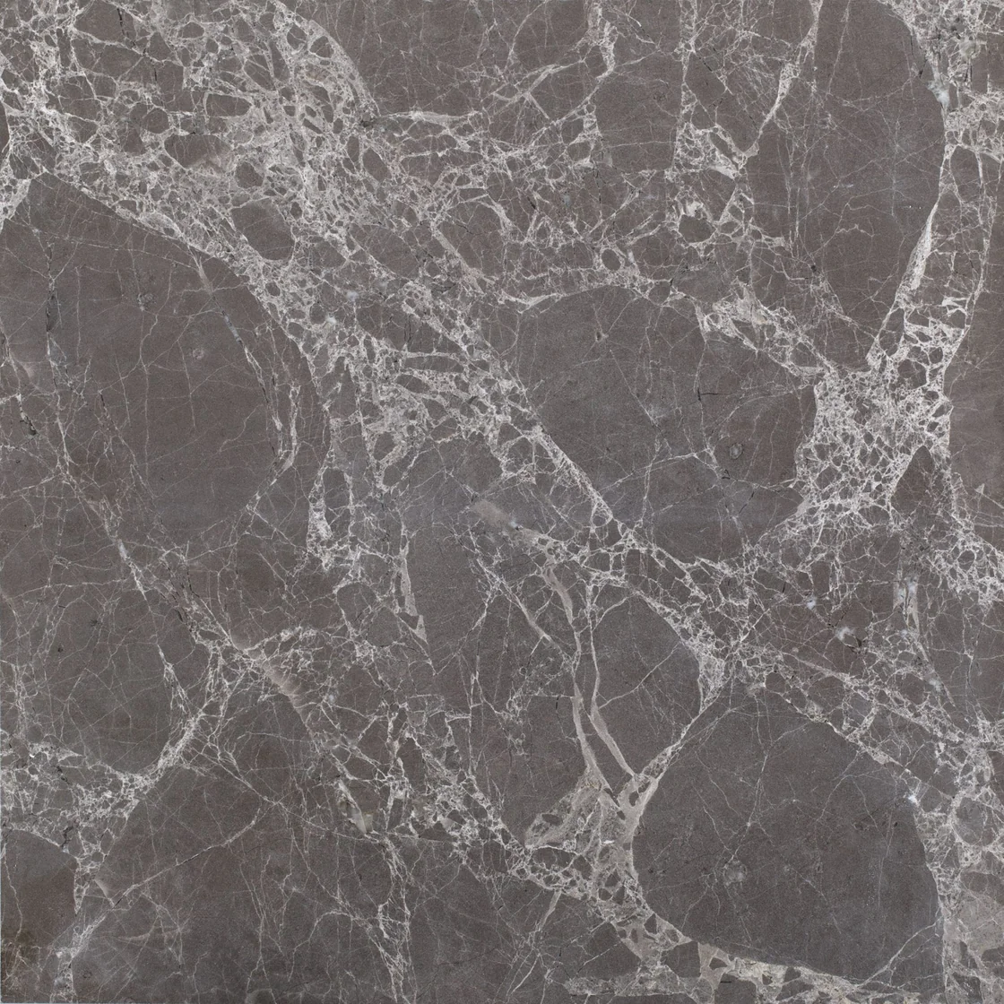 Füme Emprador | marble tile Füme Emprador marble tile — deep charcoal and smoky grey tones, a web of intersecting cream and white veins