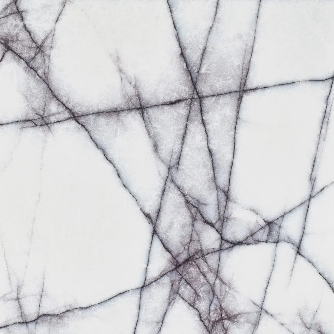 Milas Leylak | marble tile Milas Leylak marble tile — a clear white background, bold plum-coloured veins against pale mineral areas
