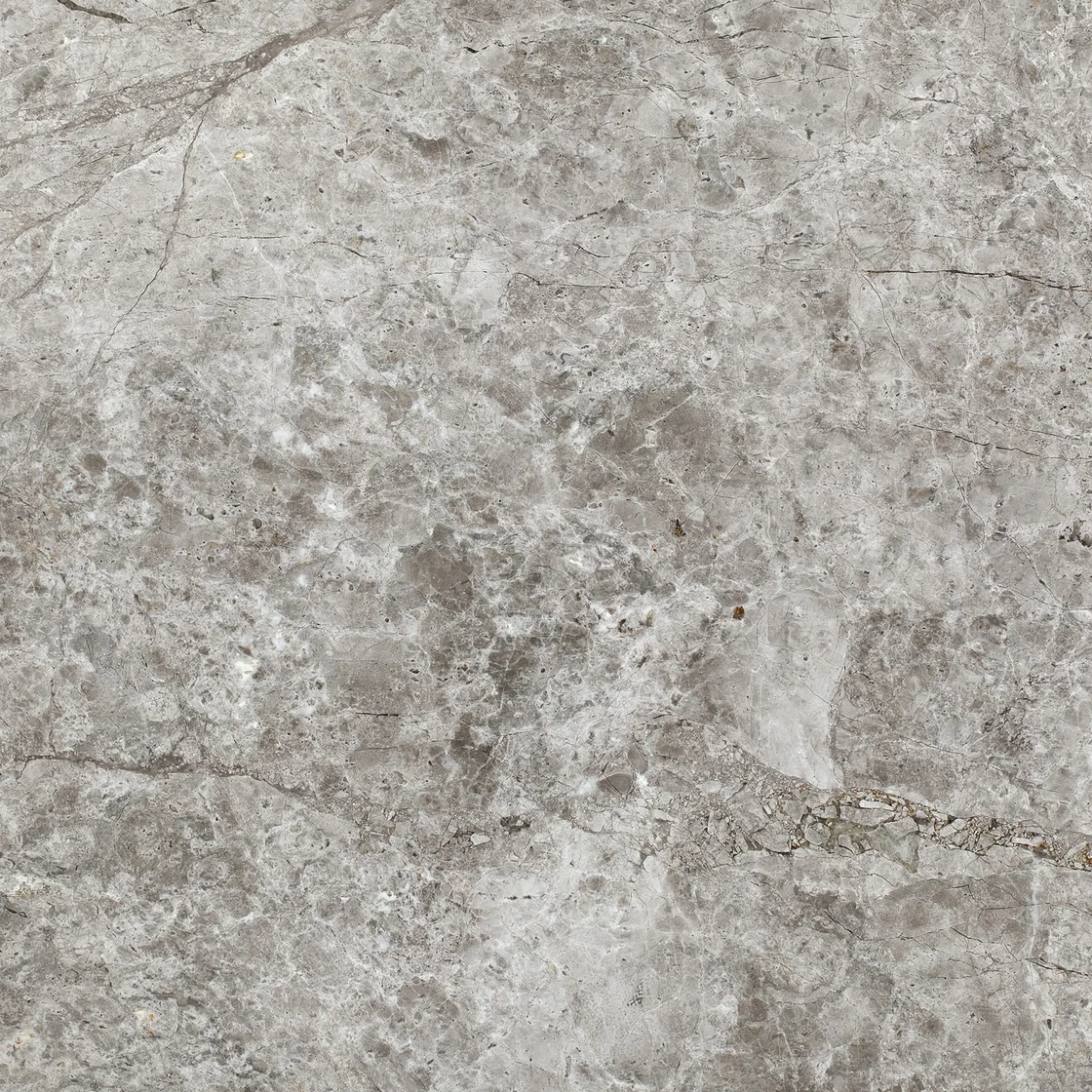 Tundra Blue | marble tile Tundra Blue marble tile — pale silver-grey and cream tones, soft smoky patches and subtle darker accents
