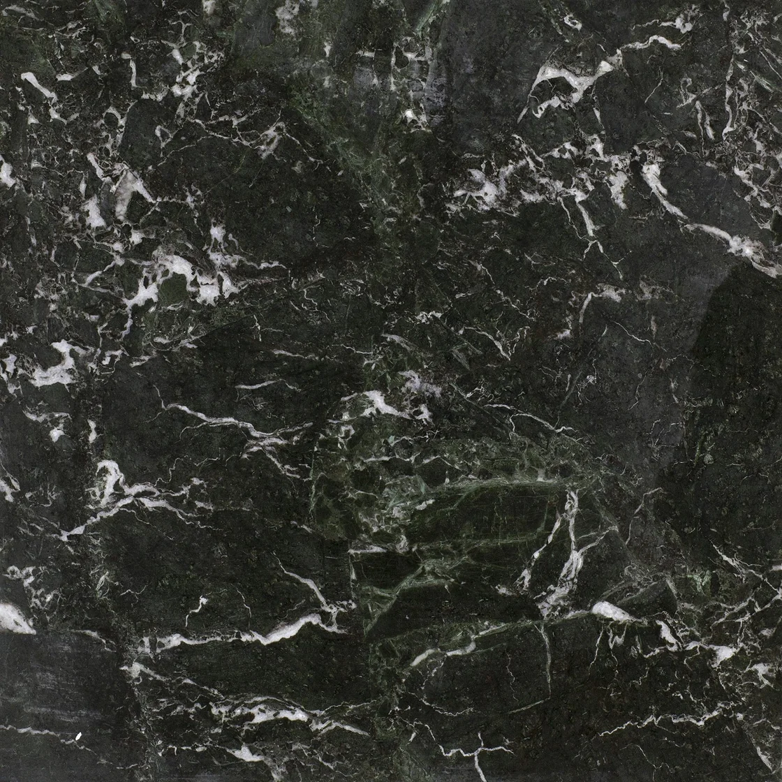 Verde Antico | marble tile Verde Antico marble tile — deep green and charcoal tones, a web of intersecting cream and white veins