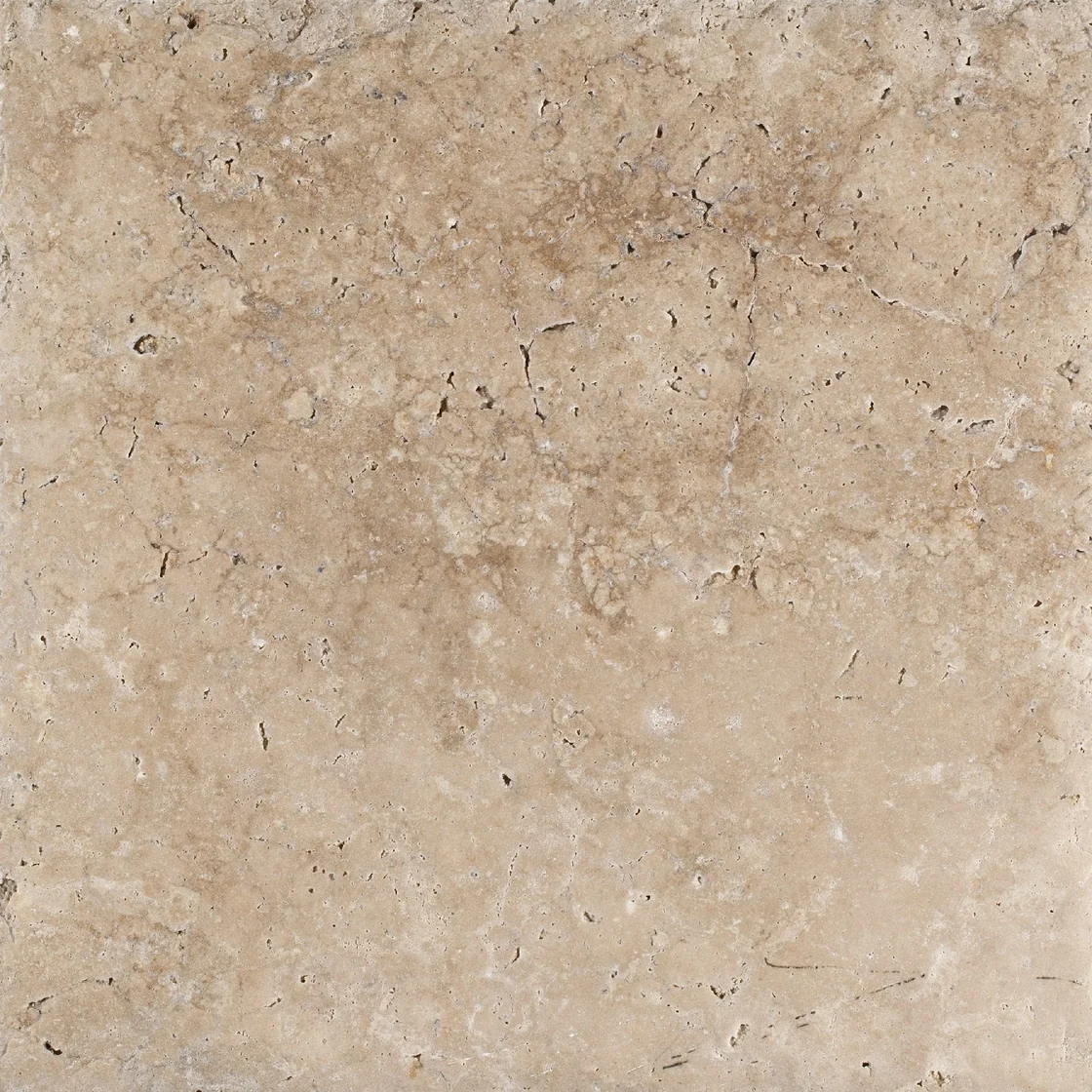 Noxos Travertine Brushed And Chiseled Edge | travertine tile Noxos Travertine Brushed And Chiseled Edge travertine tile — warm beige and pale cream tones, small scattered pores and restrained natural variation
