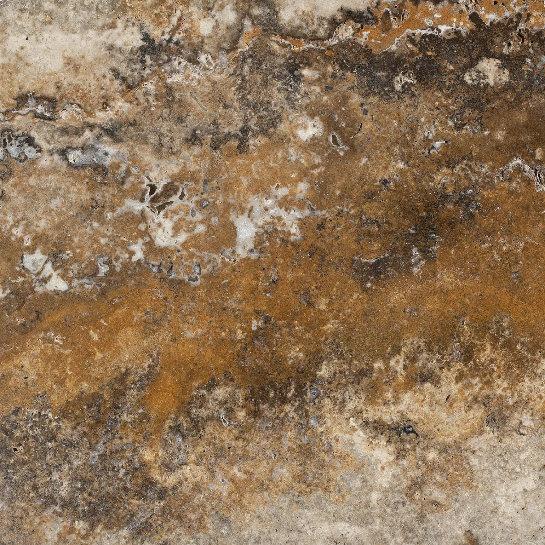 Scabos | travertine tile Scabos travertine tile — caramel brown and golden beige tones, contrasting dark patches and clustered mineral details
